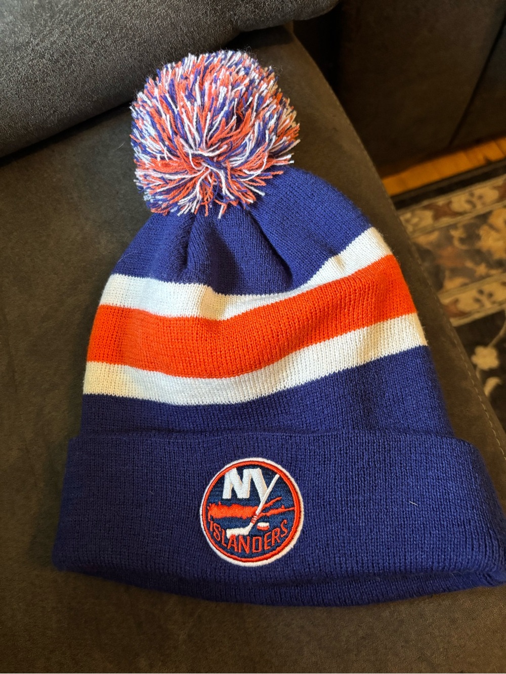 Islander Blue, Orange & White Pom Cuffed Knit Beanie with Team Emblem
